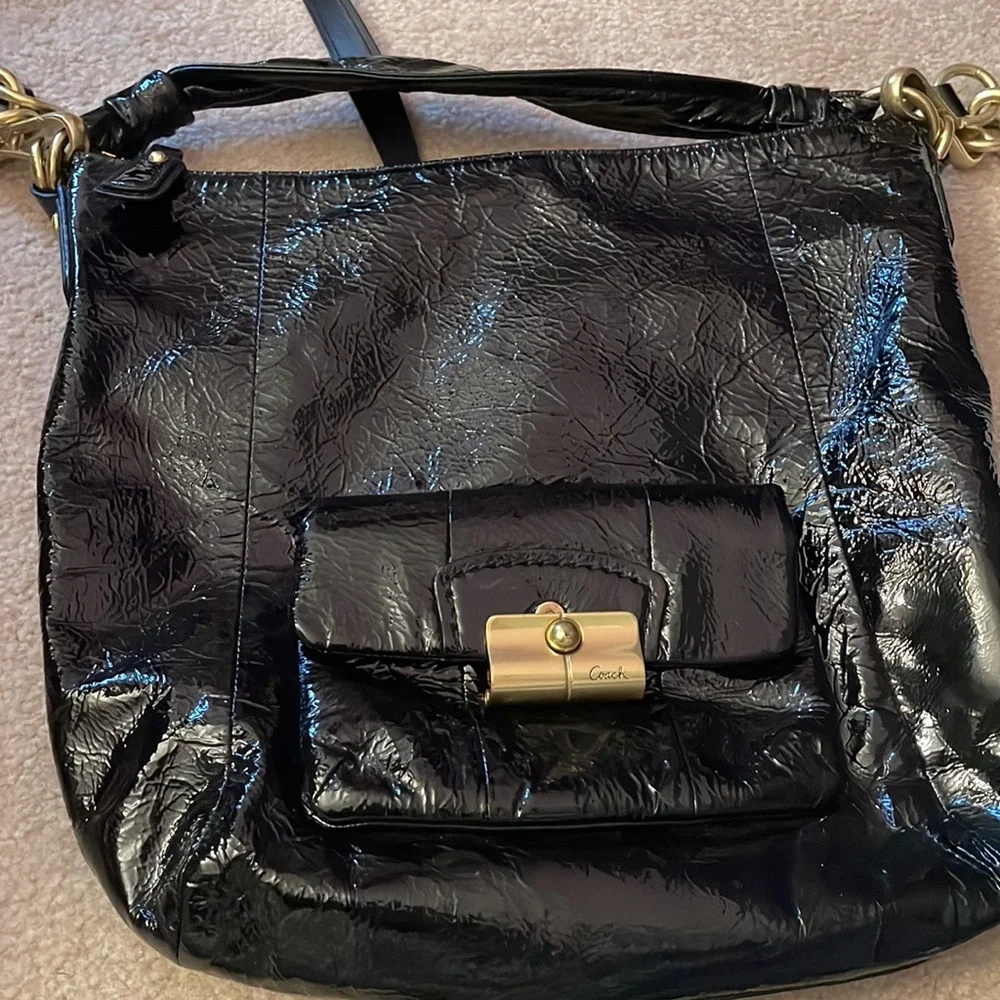 Coach black patent leather hobo bag